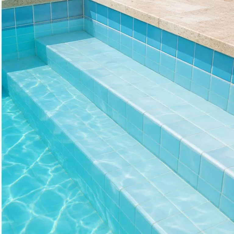 After: Illustrative comparison: stained steps and clean pool tiles.